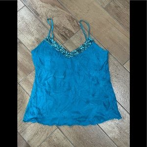 Bright blue M top